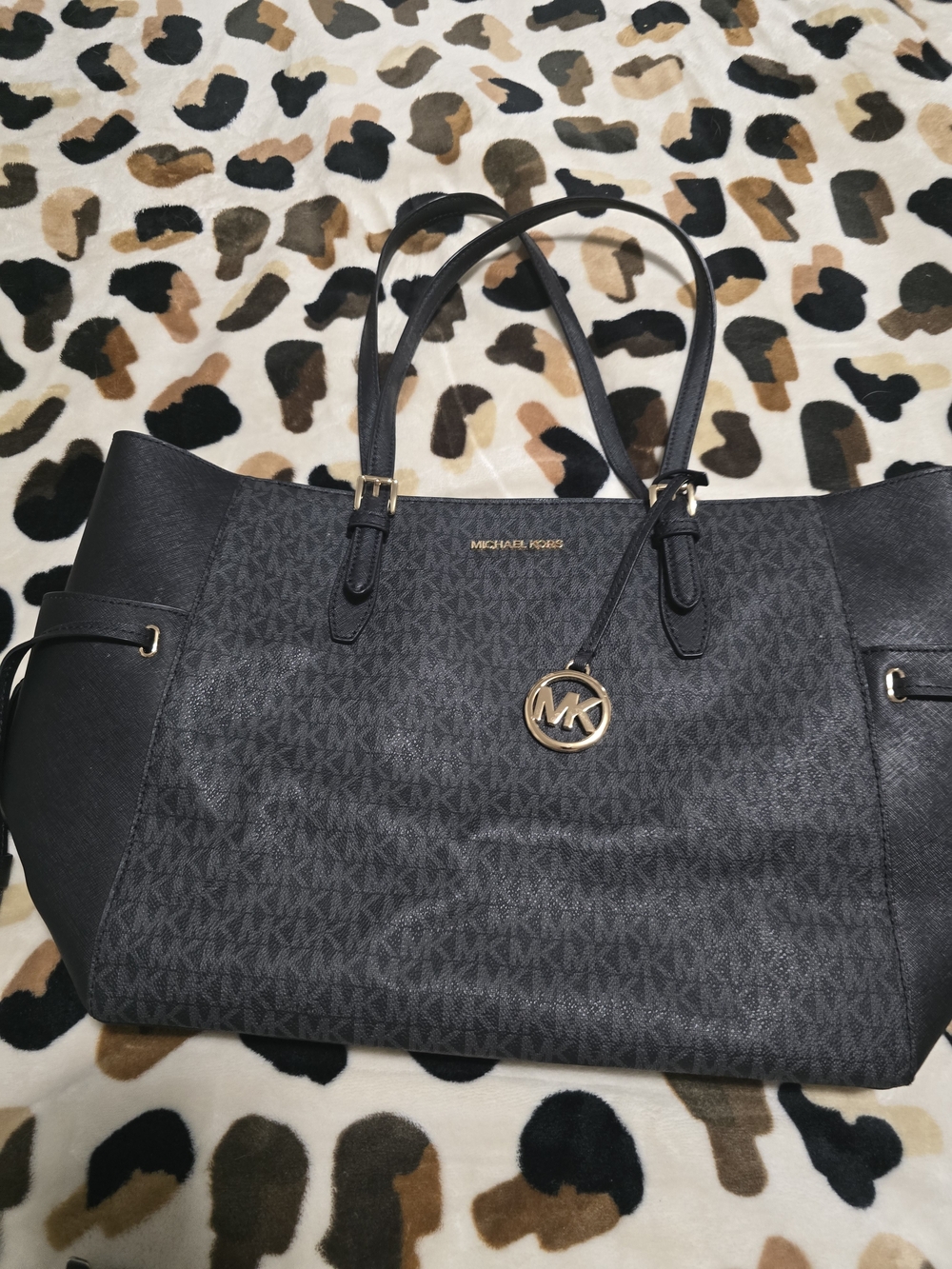 Michael Kors Black MK Logo Shoulder Tote with Gold Charm And matching wallet.